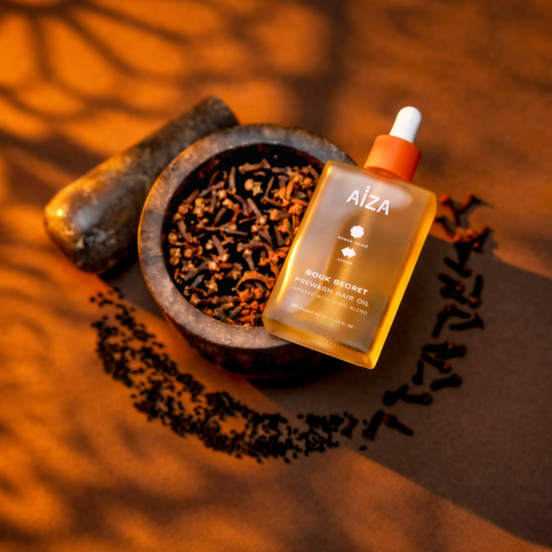 Aiza Souk Secret product texture showing rich cream formulation